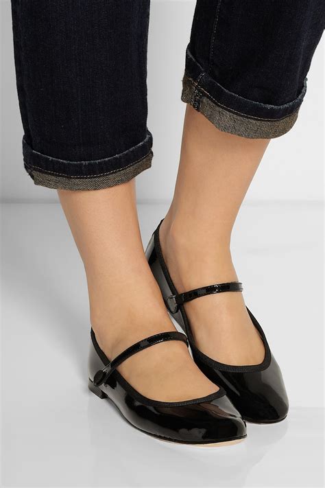 Leather Mary Jane Flats in Black .